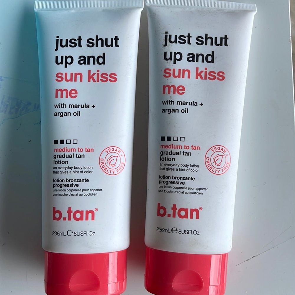 B. tan just shut up and Sun kiss me Medium to tan lotion.
